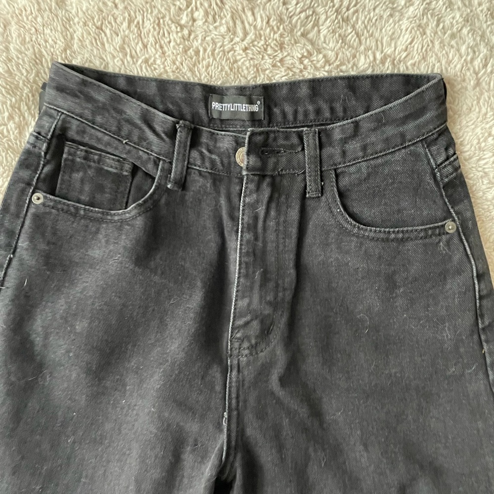 Black split hem jean